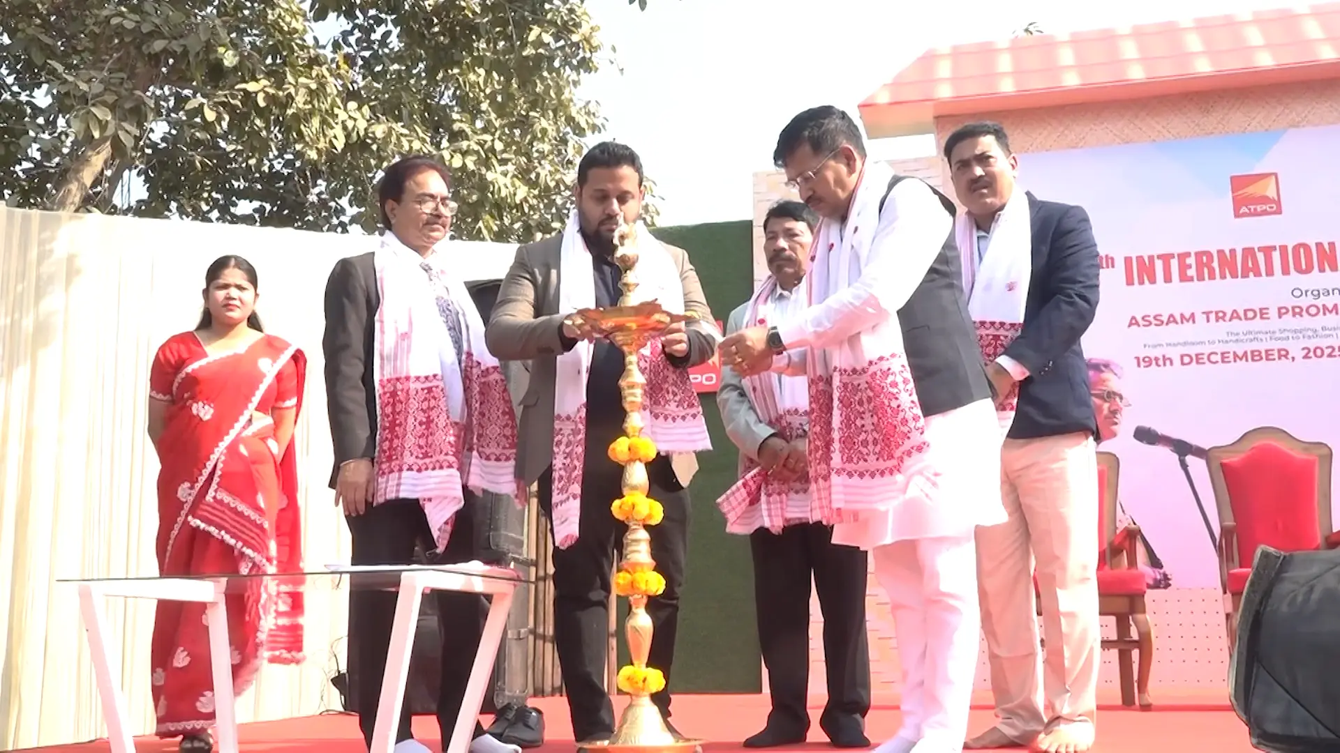 Traditional lamp lighting ceremony with dignitaries